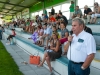 FuÃÅ¸ball-Festspiele in Seekirchen am 04.08.2012
Stadtmusik Seekirchen (grÃÂ¼n)  - Wiener Philharmoniker (rot)  3:9  
AltbÃÂ¼rgermeister und AltprÃÂ¤sident des Lions Club Seekirchen, Johann Spatzenegger,  begrÃÂ¼sst die GÃÂ¤ste und wirbt fÃÂ¼r Spenden fÃÂ¼r die Sonneninsel  
Foto und Copyright: Moser Albert, Fotograf und Pressefotograf, 5201 Seekirchen, Weinbergstiege 1, Tel.: 0676-7550526 mailto:albert.moser@sbg.at  www.moser.zenfolio.com