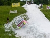 Summer Snow Waterslide in Faistenau am 21.06.2013 mit echtem Schnee, veranstaltet von der freiwilligen Feuerwehr Faistenau, Biersoldaten  
Foto und Copyright: Moser Albert, Fotograf und Pressefotograf, 5201 Seekirchen, Weinbergstiege 1, Tel.: 0676-7550526 mailto:albert.moser@sbg.at  www.moser.zenfolio.com